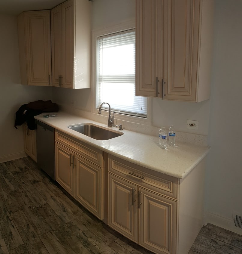 Kitchen with Stainless steel appliances which includes a side by side ref microwav with dishwasher - 900 Dunlop Ave (Forest Park, IL)