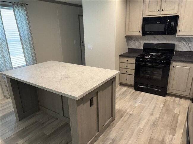 Foto del edificio - 3617 N Grand Ave E