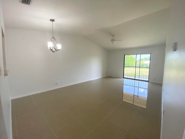 Building Photo - 9431 Boca Cove Cir