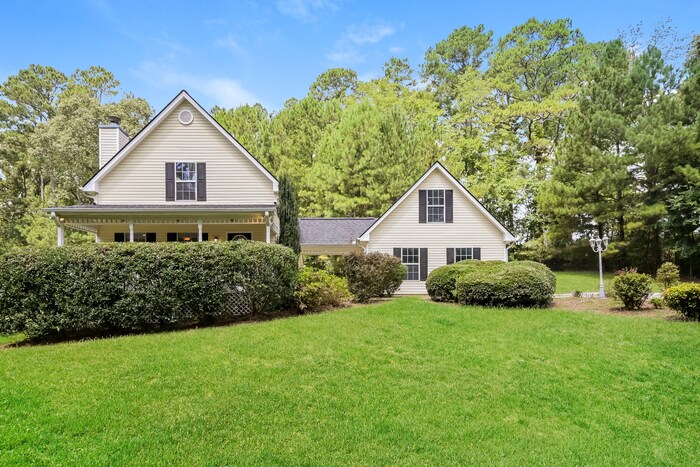 Primary Photo - Charming Home on Spacious Tree-Lined Lot