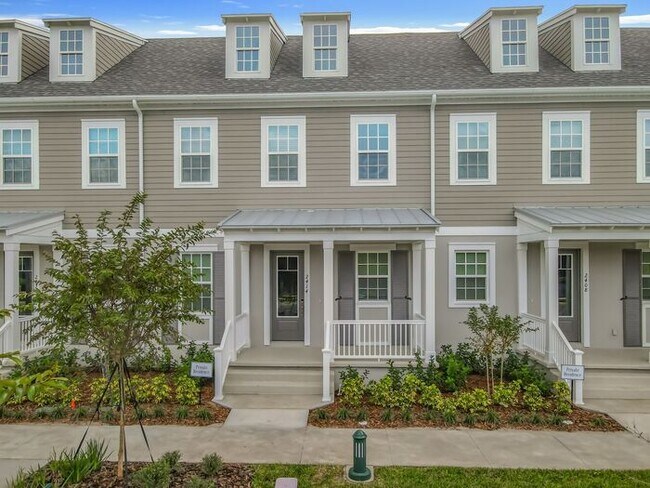 Building Photo - New Luxury Townhome in Celebration with All porcelain tiled floors. Island Village new construction