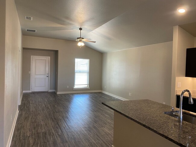 Building Photo - Beautiful Custom Brick Home 3 bed/ 2 bath/ 2 car garage Open Concept with spacious backyard locat...