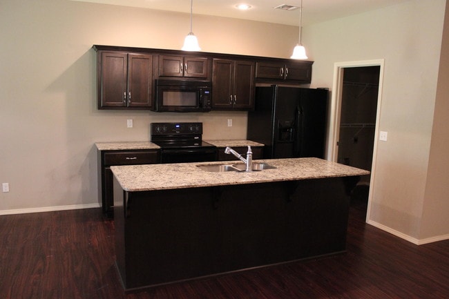 Building Photo - 5001 Raintree Cir
