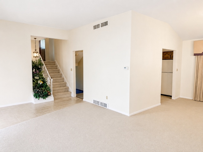 Building Photo - Spacious 3-Bedroom Split-Level with Formal Dining Room, Fireplace, and Fenced Backyard