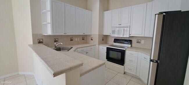 Building Photo - 3 br, 2.5 bath House - 5538 Boynton Garden...