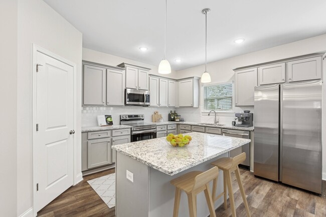 Another view of the spacious kitchen and stainless steel appliances - Southwind