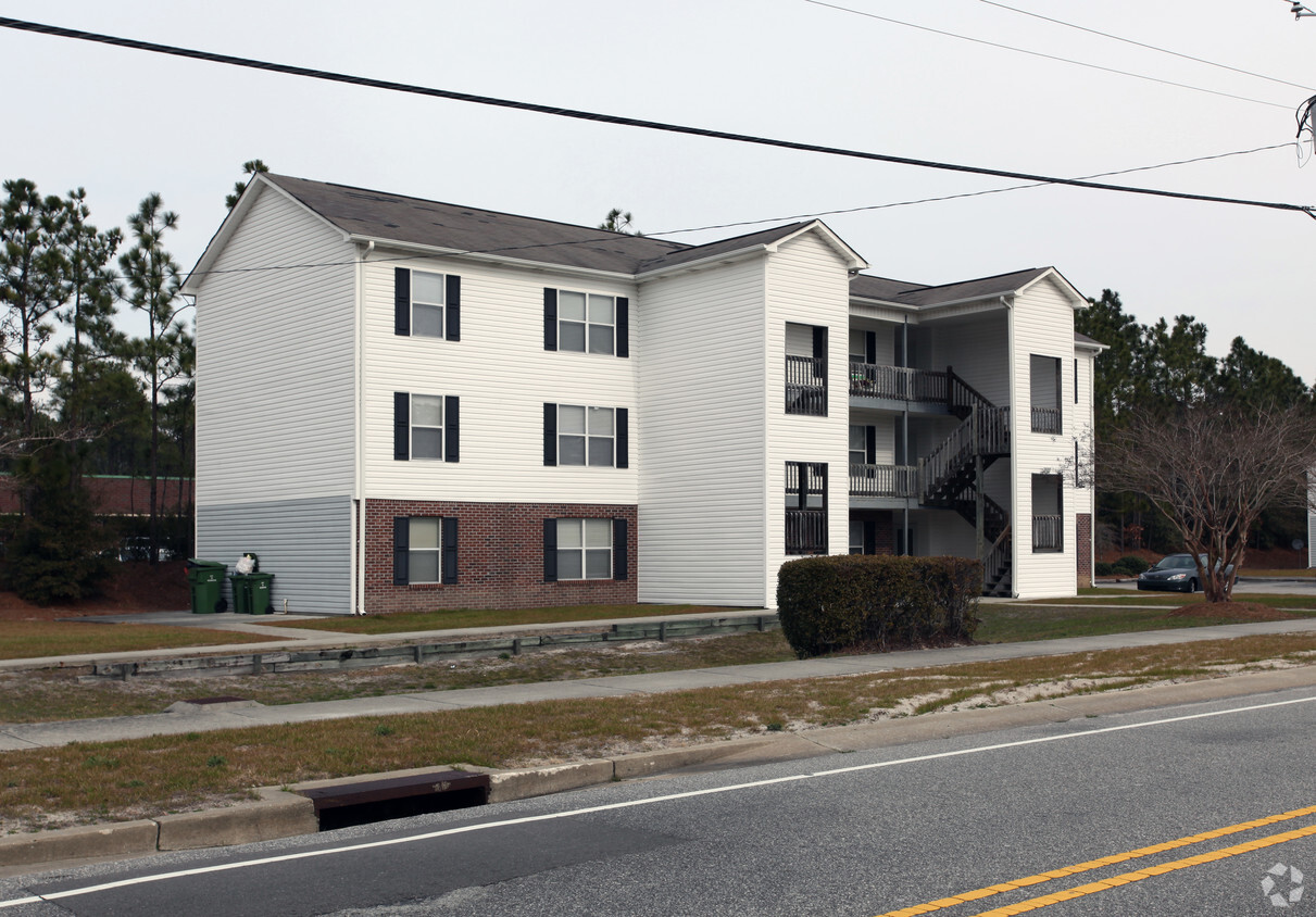 Building Photo - Wellington Place Apartments