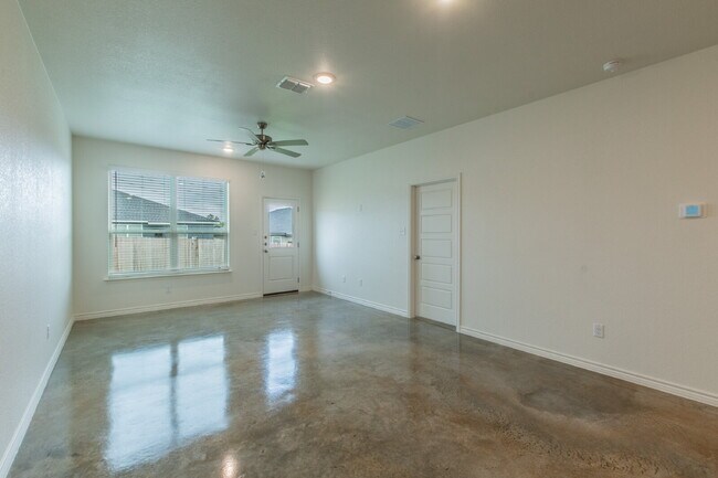 Building Photo - Brand New 3BR Duplex with Modern Concrete Floors & Fenced Yard!