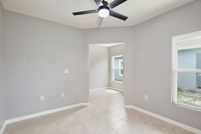 Building Photo - Move-In Ready 2BR/2BA Villa with Den + 2-Car Garage | Lake Nona Adjacent | Suncrest at St. Cloud