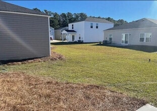 Building Photo - 1099 Pink Snapper Pl NW