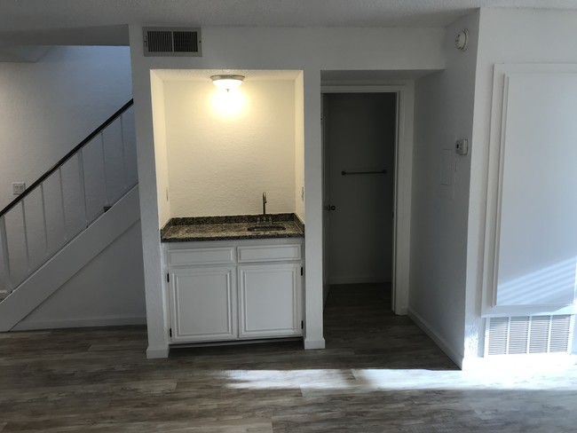 wet bar with half bath - 227 W Palm Ave