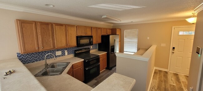 Foto del edificio - 5610 Harbor House Dr