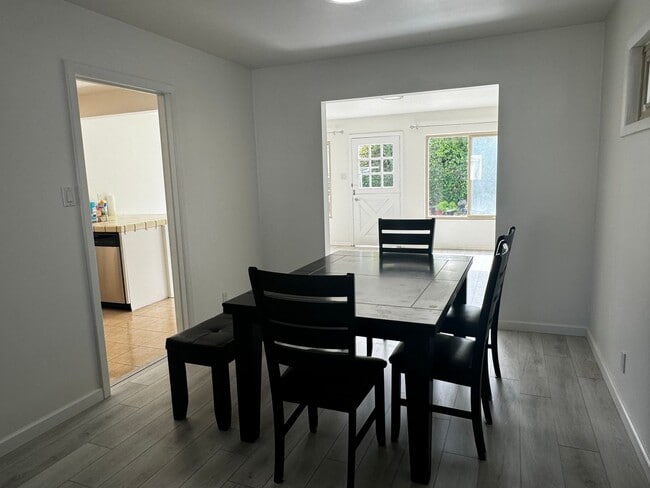 Building Photo - Light-Filled Living in this Charming 4-Bed...