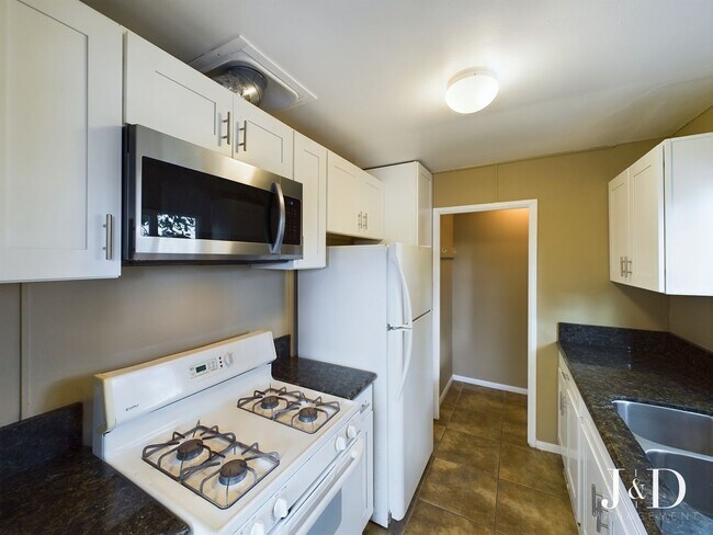 Building Photo - Property with Spacious Units, Private Outd...