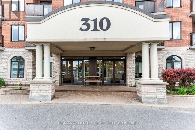 Building Photo - 310-310 Central Park Dr
