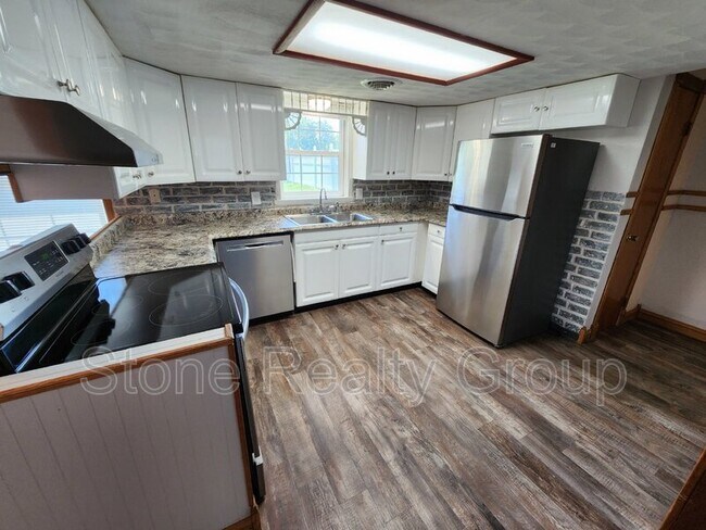 Foto del edificio - 4433 E Evans Ave