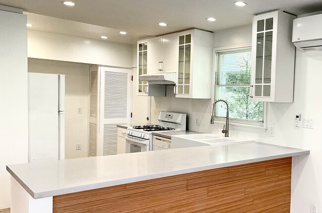 Across granite countertop into kitchen - 12114 Ohio Ave