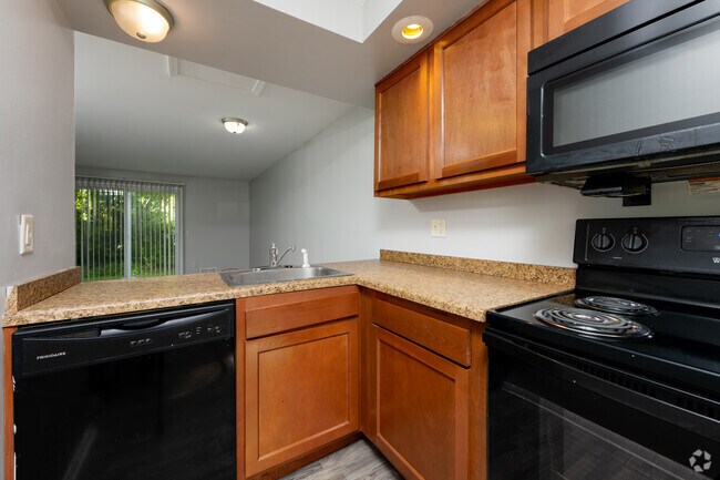 2 habitaciones, 1,5 baños - 1000 pies cuadrados - Cocina - North Shore Townhomes