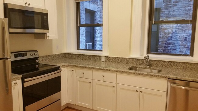 Building Photo - central Heat/AC, Lead-Free Unit, Laundry o...