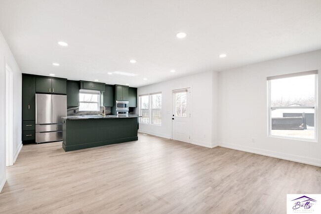 Building Photo - BE PREPARED TO BE AMAZED!! 4 CAR GARAGE IS...