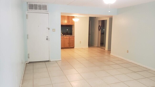 Living and dining room (current paint: pale blue) - 2603 Fort Farnsworth Rd