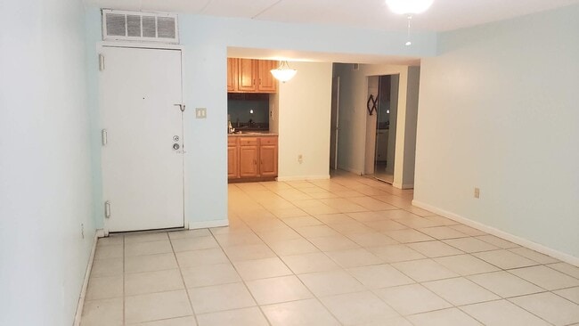 Living and dining room (current paint: pale blue) - 2603 Fort Farnsworth Rd