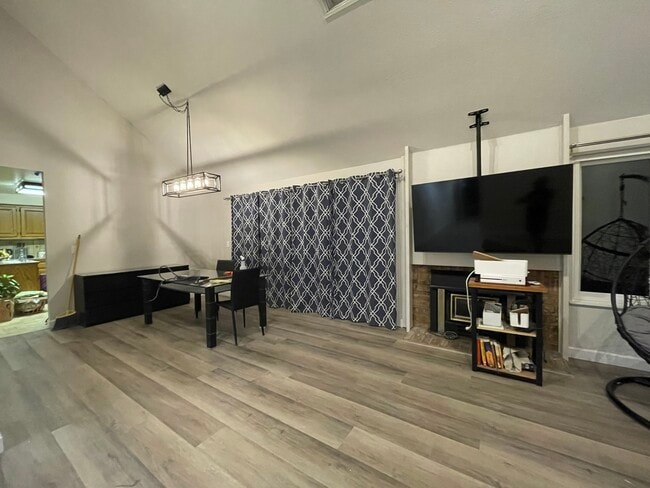 Dining area and 12 foot patio door - 14209 NE 63rd Ct