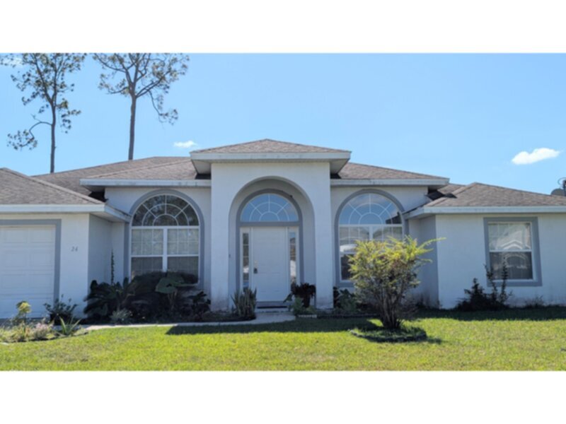 Foto principal - 4 Bedroom, 3 Bath Spacious House in Palm Coast, FL