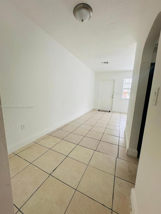 Building Photo - 115 NW 56th Ave.