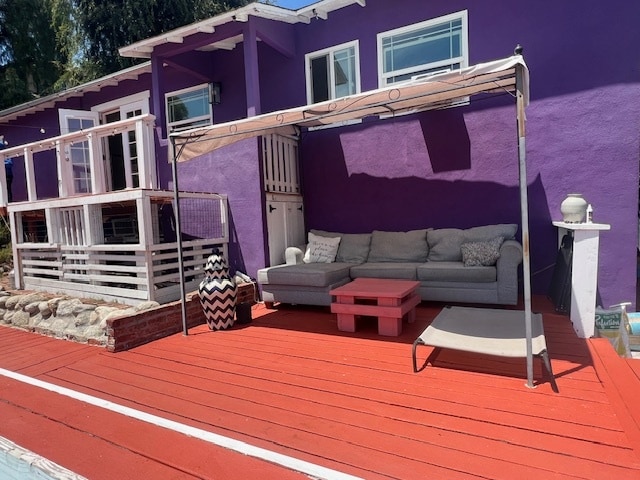 Outdoor living room with a 100 inch TV and surround sound for night time entertainment - 2252 Branden St