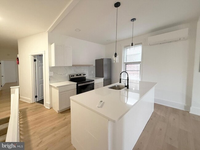 Photo - 114 S 58th St Townhome