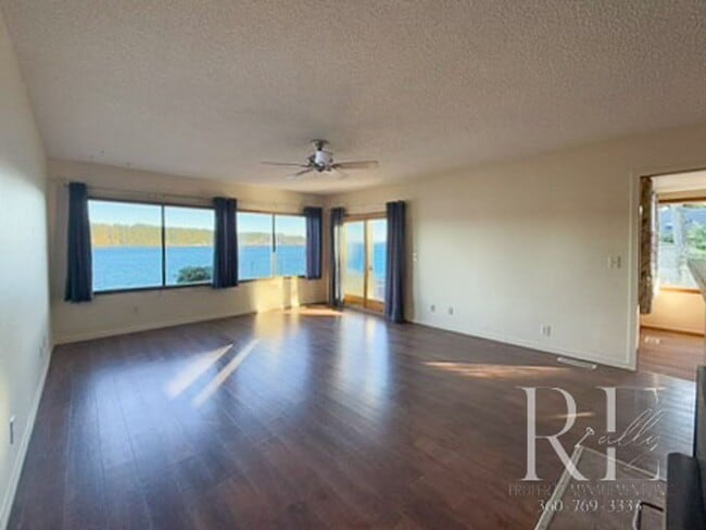 Building Photo - Waterfront Bliss: Stunning Puget Sound Views & Your Own Private Beach!