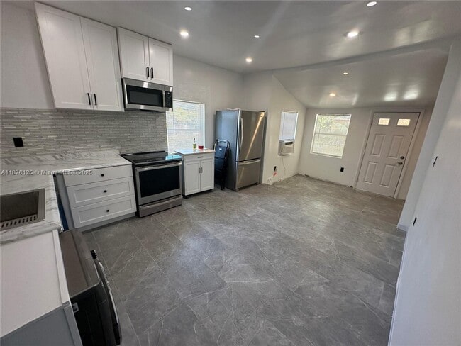 Building Photo - 288 NE 58th Terrace