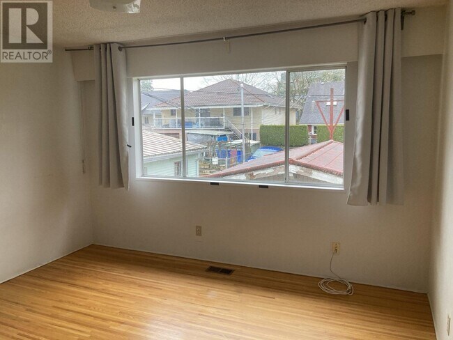 Photo du bâtiment - 1104 E 18th Ave