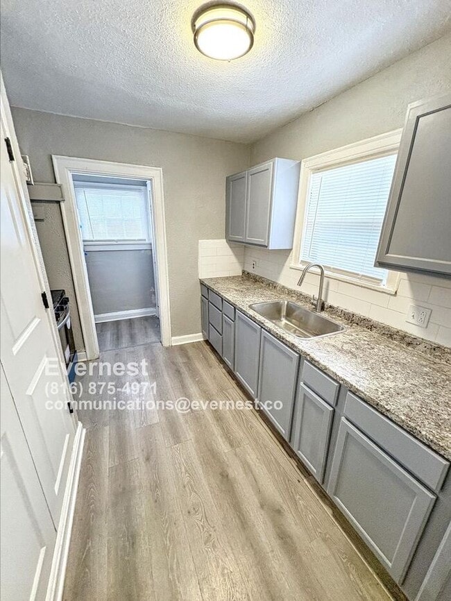 Building Photo - Charming 4-Bedroom Home with Finished Base...