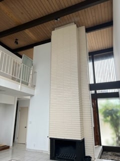 2 story fireplace in living room - 16413 S Dalton Ave