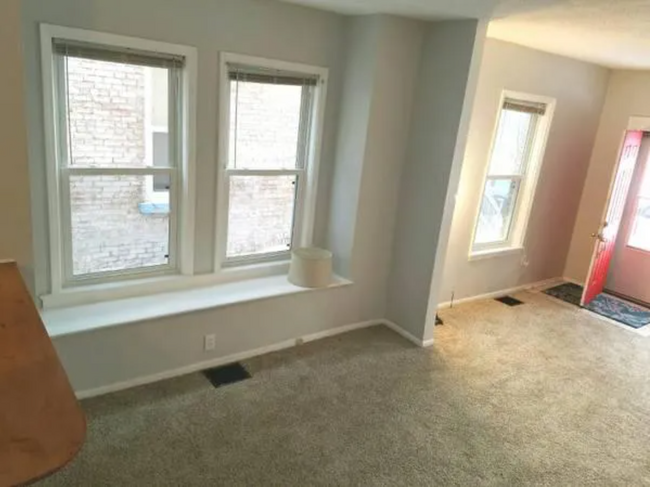 Dining room and living room from kitchen - 652 Clarissa St