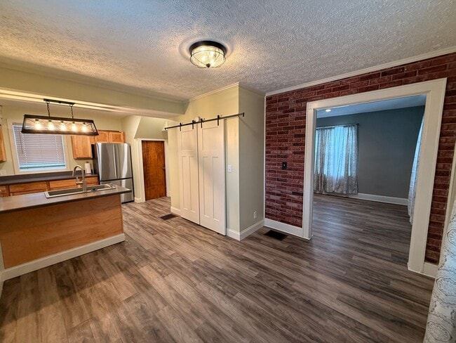 Building Photo - 3 Bedroom 2 1/2 Bathroom with one car detached garage