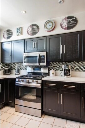 Updated kitchen - 1629 E Palm Ave Townhome