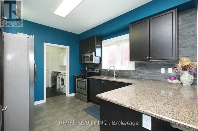 Photo du bâtiment - 825 Black Cherry Dr
