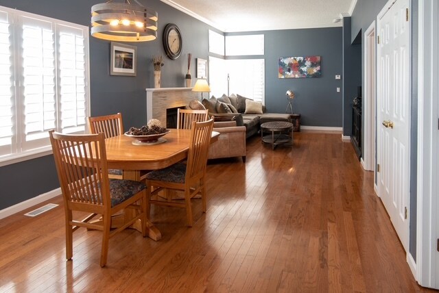 Dining room with hardwood floors - 5555 E Briarwood Ave