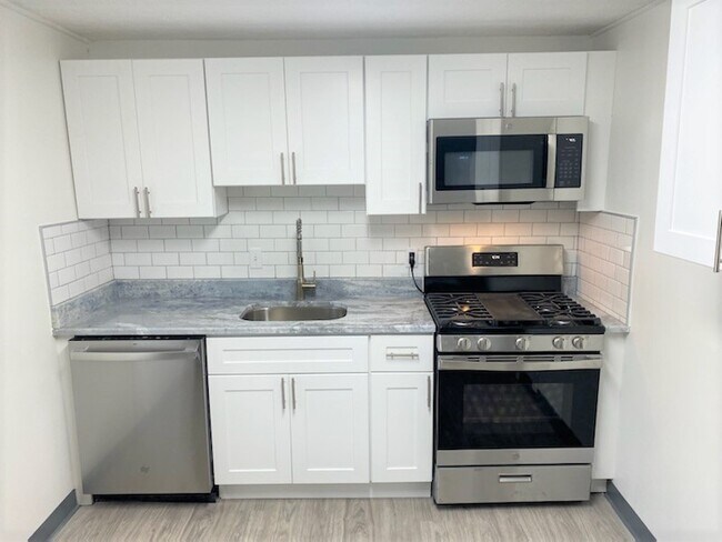 Granite countertops and backsplash - 508 Central Ave