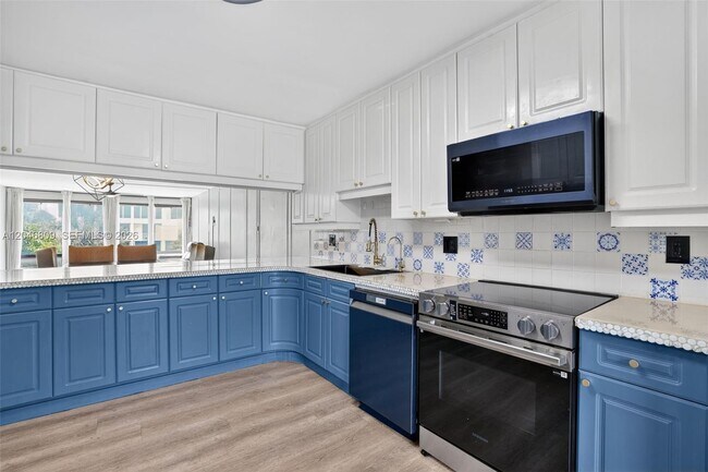 Building Photo - 10240 Collins Ave