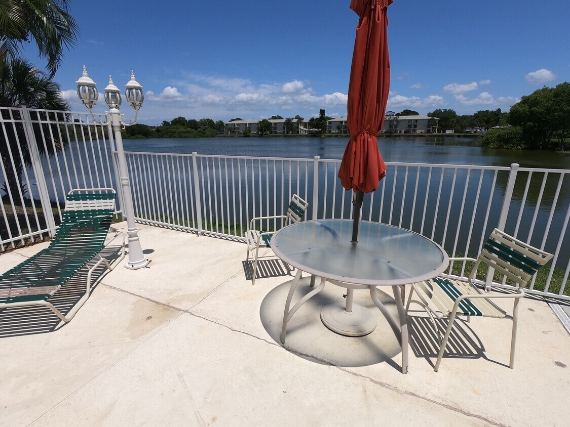 Sitting area by lake - 11485 Oakhurst Rd