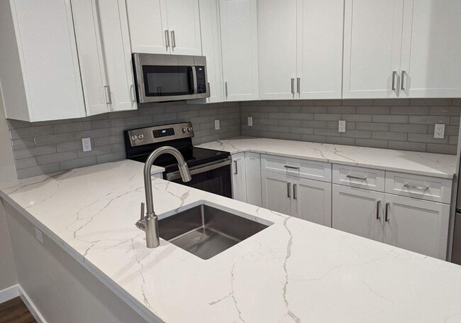 White Stone Counters Featured in Apartments #102, #104, & #106 - The Point at Gateways