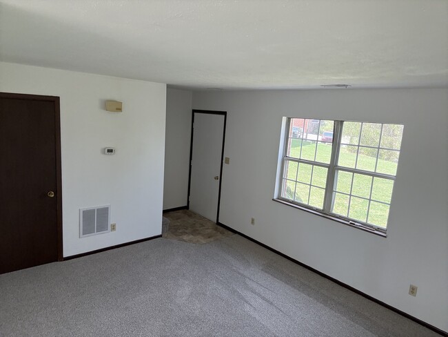 LIVING ROOM FROM DINING AREA - 715 Pearl Dr