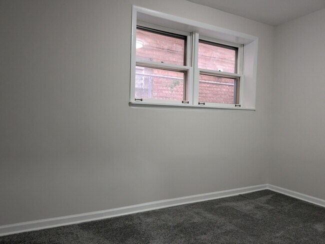 Building Photo - 5701 S Archer Ave