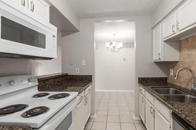 Foto del edificio - 10555 Turtlewood Ct
