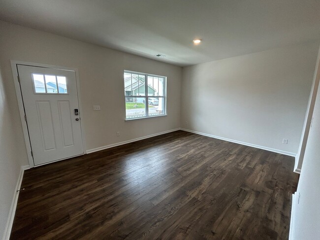 Building Photo - West AVL - 2023 Build, Three Bedrooms plus...