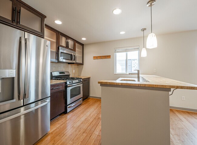 Beautiful kitchen with Travertine counters - 12531 26th Ave NE